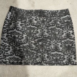 Express size 4 mini skirt. Metallic silver and black. Good condition.